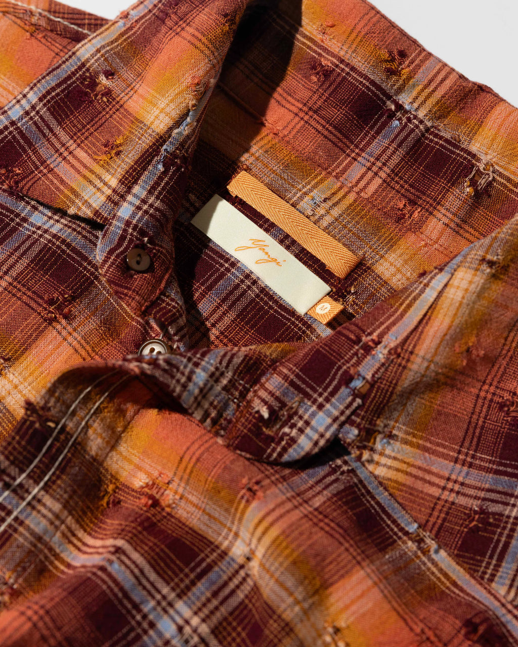 YANGI - Distressed Plaid Shirt