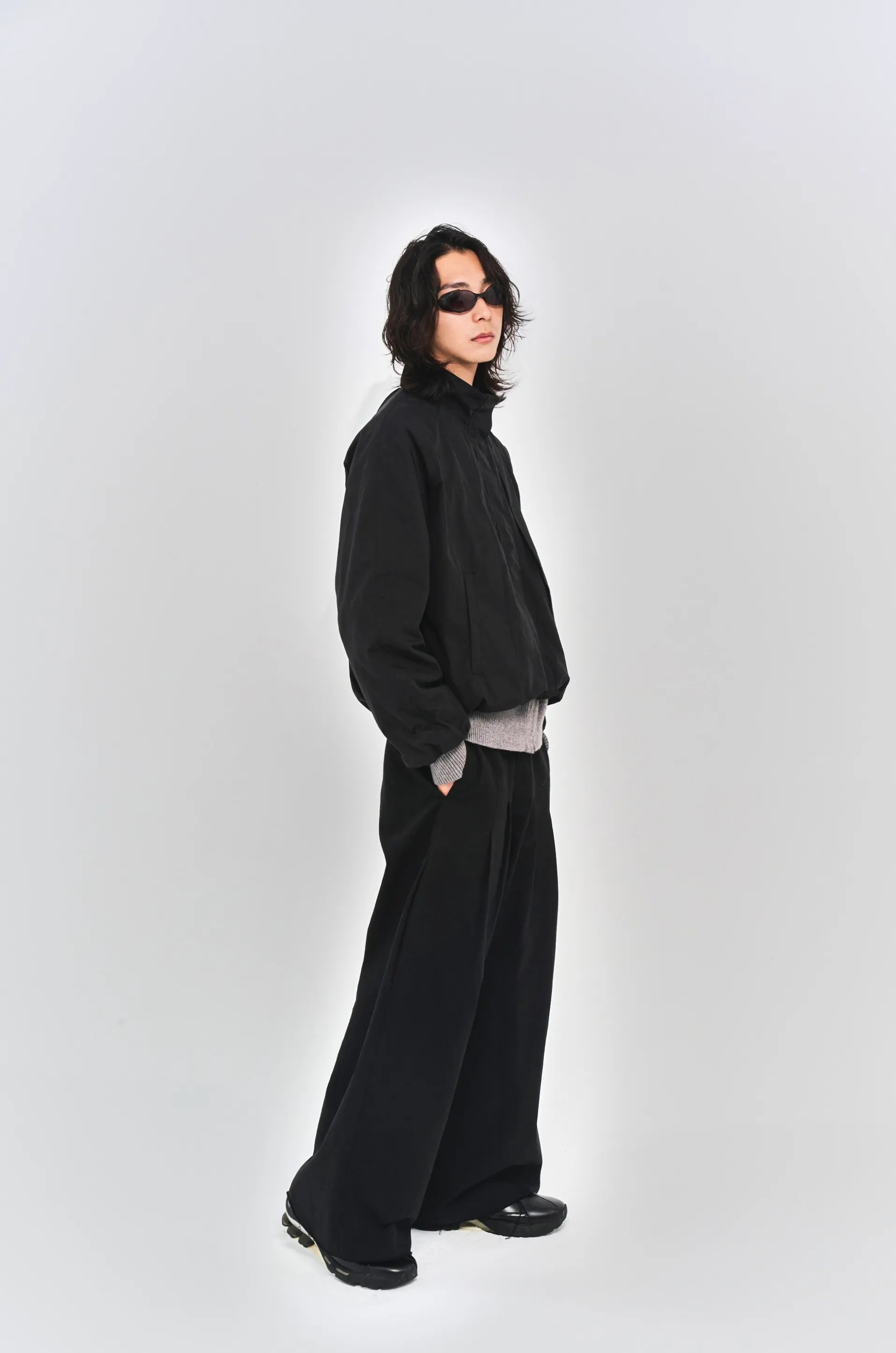 ALEE OASIS Wide-Leg Pleated Raw-Edge Trousers